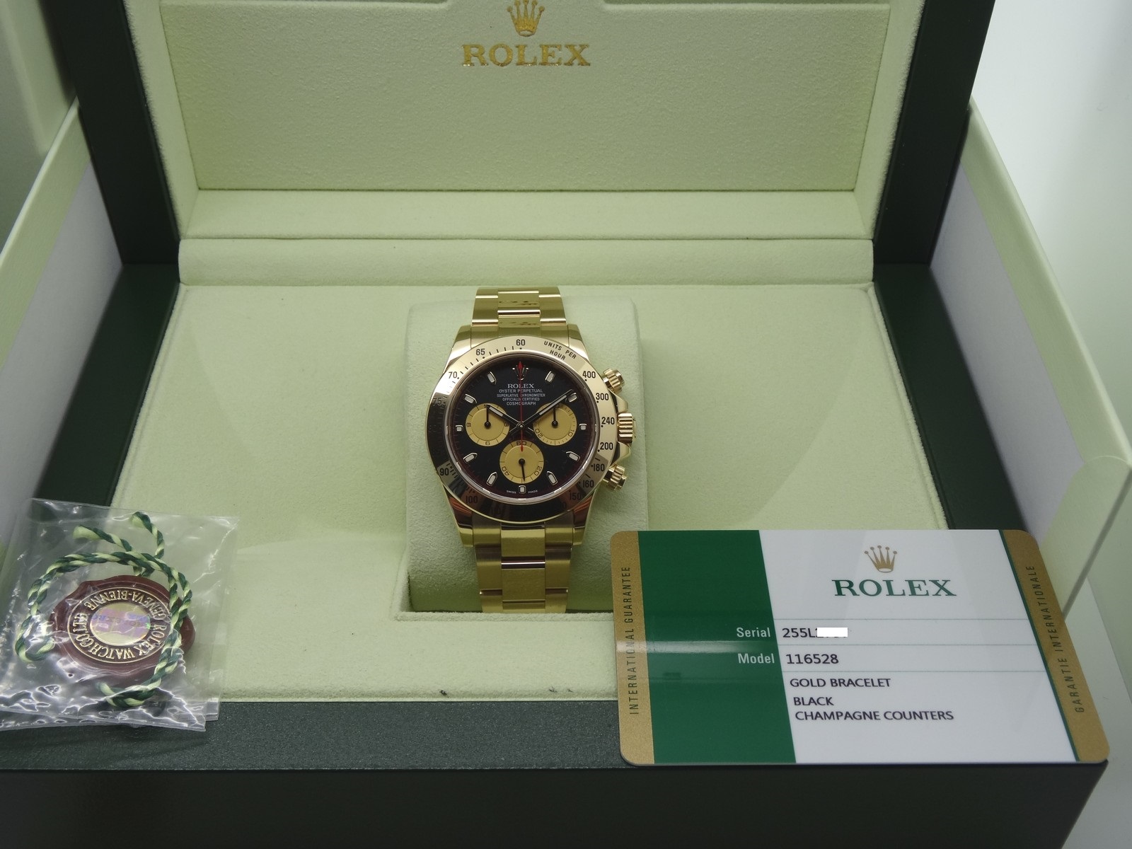 Up for sale is a MINT Rolex Daytona 116528 in 18K Yellow Gold on bracelet w...